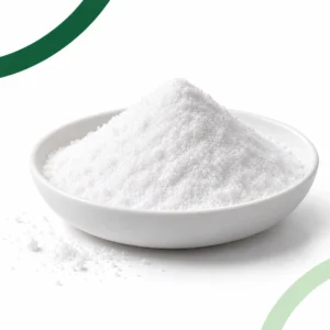 White crystalline HMB-Ca monohydrate in a shallow white dish on a bright studio background